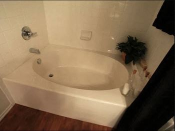 Exclusive garden-style oval soaking tubs in select homes